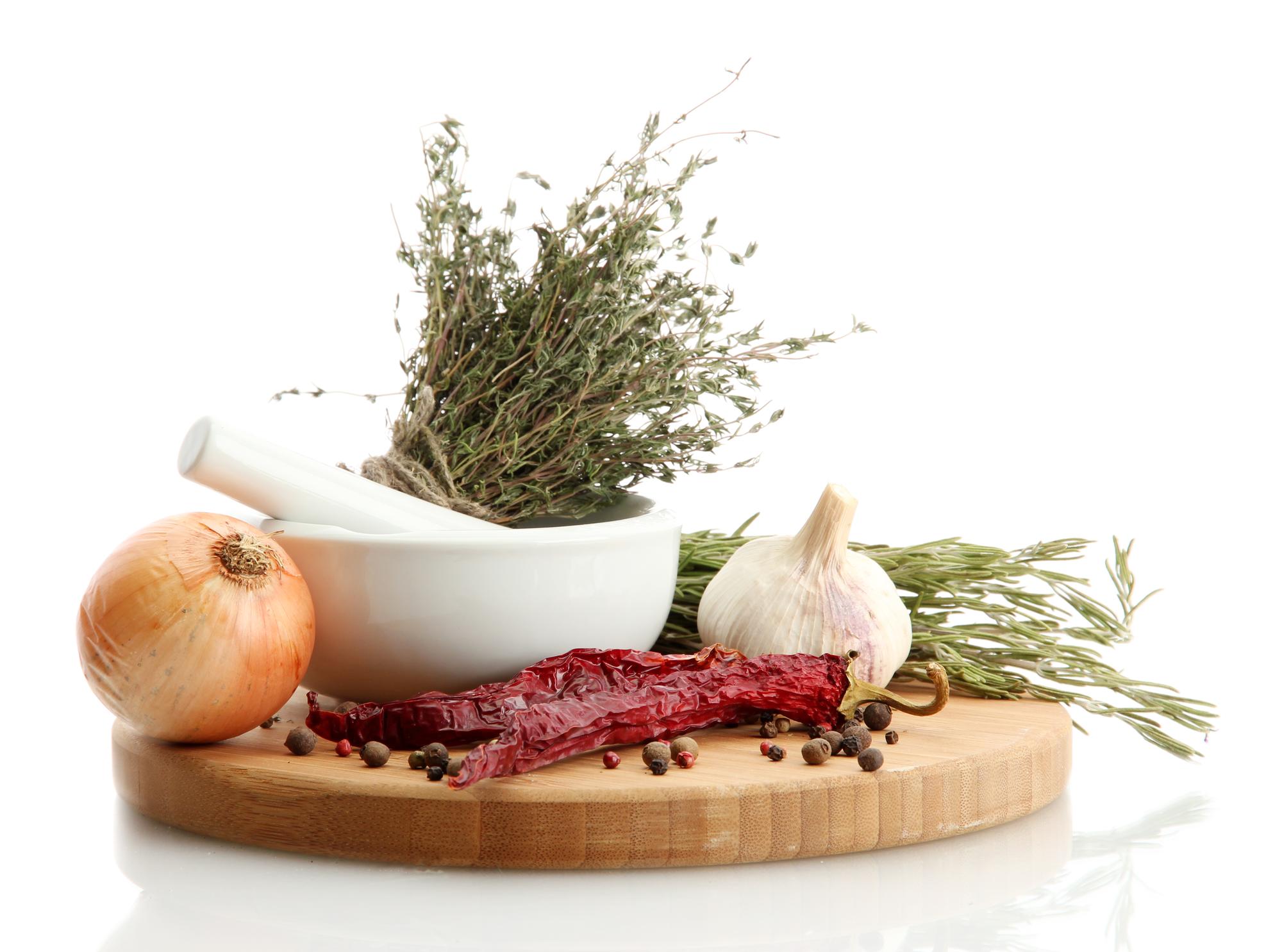 Herbs and spices on wooden board